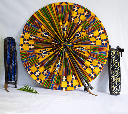 Handmade Ankara fabric fan with leather handle – Red dominant