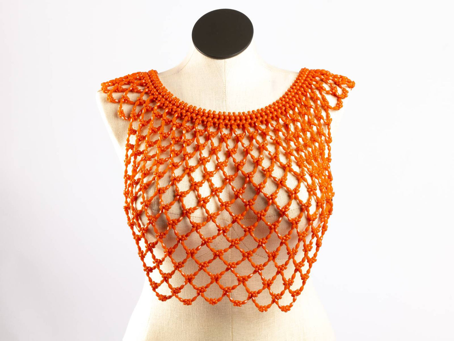 Orange full cowry shell bridal bib, front view
